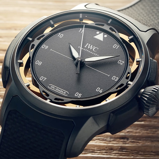 A close up of a watch with a black strap