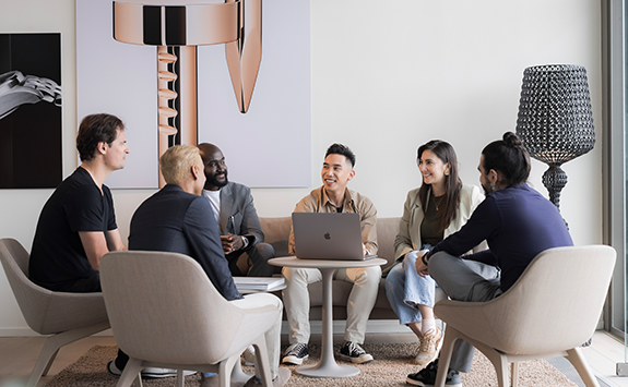 A group of workers having a meeting in the office