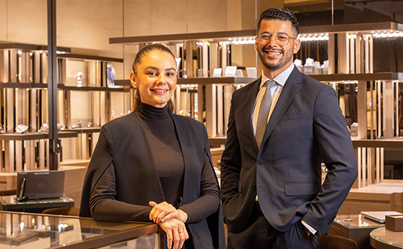 A man and a woman in a showroom